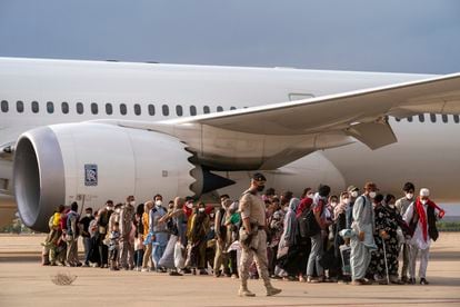 Afghan refugees arrive at the Torrejón de Ardoz airbase in Madrid on Monday.