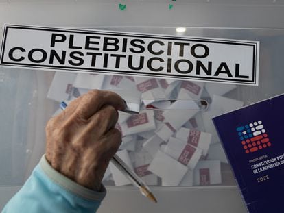 A person votes in the September 2022 referendum in Santiago, Chile.