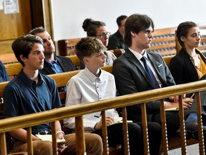 Plaintiffs Mica, 14; Badge 15, Lander 18, and Taleah, 19, listen to arguments during a status hearing on May 12, 2023, in Helena, Mont.