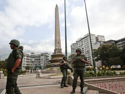 Members of the Venezuelan National Guard watch over Caracas's Plaza Altamira.