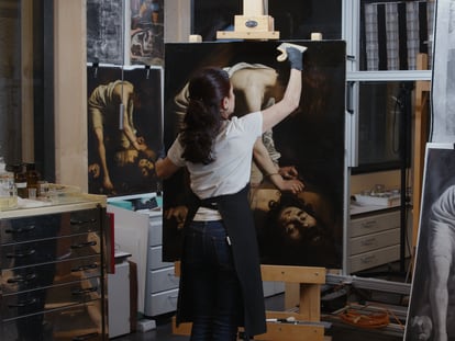 Almudena Sánchez works on the restoration of the Prado Museum's 'David with the Head of Goliath' by Caravaggio