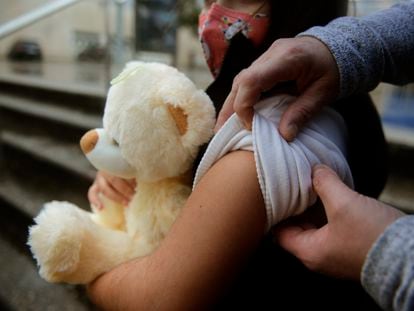 A child about to get a Covid-19 vaccine in Ourense, Spain.