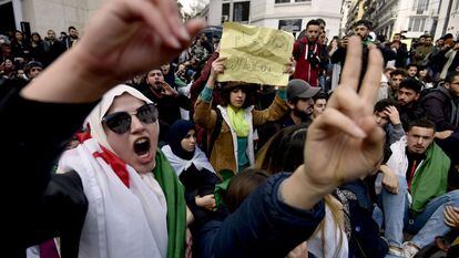 Youngsters protest in Algeria in 2019 for fair presidential elections.