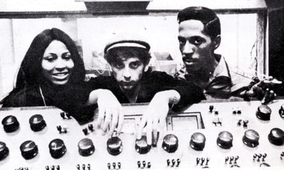 Tina Turner, Phil Spector and Ike Turner behind a mixing desk.