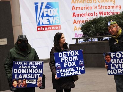 Activists protest outside Fox News studios in New York, last February.