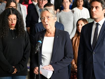 French Prime Minister Elisabeth Borne during a tribute ceremony for slain French teachers Samuel Paty and Dominique Bernard at the Bois d'Aulne school in Conflans-Sainte-Honorine, outside Paris, on October 16, 2023.