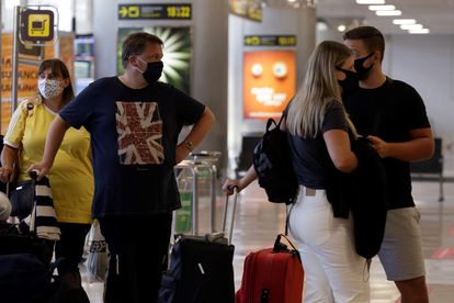 Passengers traveling to the UK in Tenerife Sur airport.