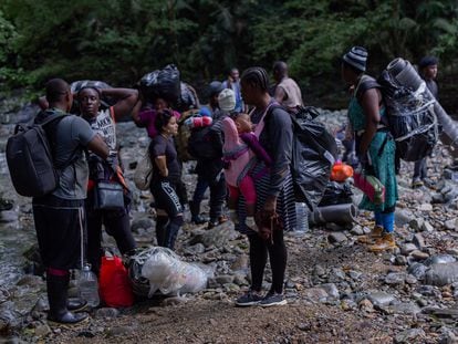 Haitian migrants cross the Darién Gap between Colombia and Panama; October 15, 2021.