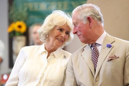 Prince Charles and the Duchess of Cornwall observe the reopening of The Strand Hall during a visit to Wales, July 4, 2018, in Builth Wells. 