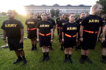 Students in the new Army prep course stand at attention after physical training exercises at Fort Jackson in Columbia, S.C., Aug. 27, 2022.