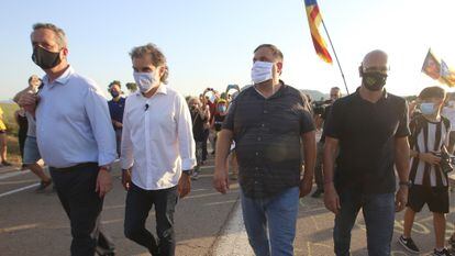 (l-r) Jailed separatist leaders Joaquim Forn, Jordi Cuixart, Oriol Junqueras and Raul Romeva outside Lledoners prison on Tuesday.