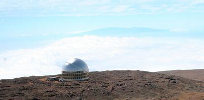An artist's rendition of what the giant TMT telescope would look like atop the Mauna Kea.
