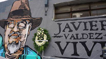 Graffiti and a wreath in memory of journalist Javier Valdez.