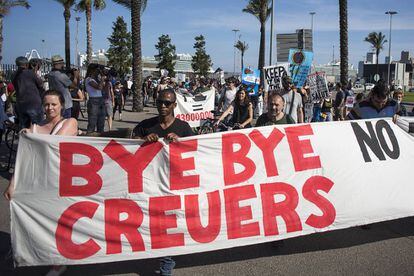 Protesters come out against massive cruise liners in Barcelona.