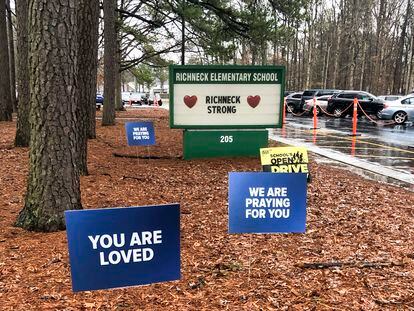 FILE - Signs stand outside Richneck Elementary School in Newport News, Va., on Jan. 25, 2023. The school is set to reopen Monday, Jan. 30, more than three weeks after a Jan. 6 shooting.