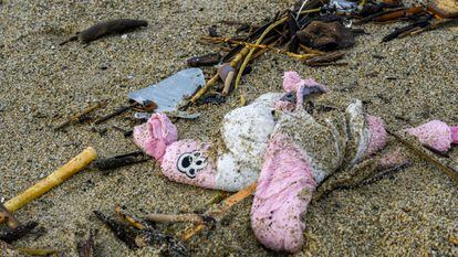 Personal belongings among the wreckage of a capsized boat washed ashore at a beach near Cutro, in southern Italy, 