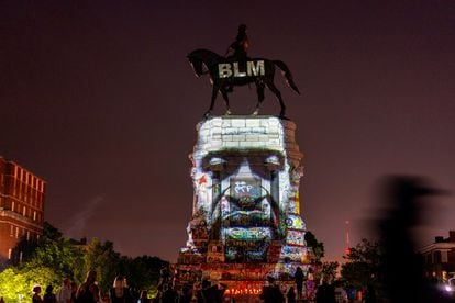 An image of George Floyd is projected onto the statue of Robert E. Lee in Richmond, June 2020.