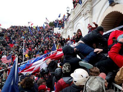 Pro-Trump protesters storm into the U.S. Capitol during clashes with police, during a rally to contest the certification of the 2020 U.S. presidential election results, in Washington, January 6, 2021.