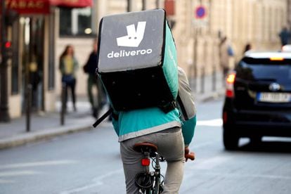 A Deliveroo courier on the streets of Madrid.