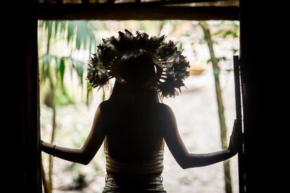 Indigenous Brazilian activist Txai Suruí, wearing one of the traditional headdresses made by the men in her community. 