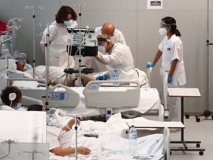 Coronavirus patients are treated at the Enfermera Isabel Zendal Hospital in Madrid this week.