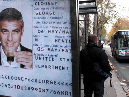 Actor George Clooney advertising Nespresso coffee machines at a bus shelter in Paris.