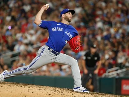 Toronto Blue Jays relief pitcher Anthony Bass throws to a Minnesota Twins batter during the ninth inning of a baseball game Thursday, Aug. 4, 2022, in Minneapolis.