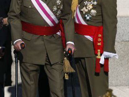 Spain's King Juan Carlos arrives at the Royal palace on Sunday.