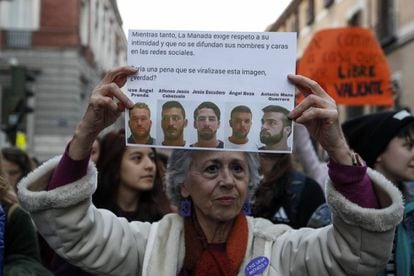 A woman protests outside the Pamplona court where the La Manada trial is taking place.