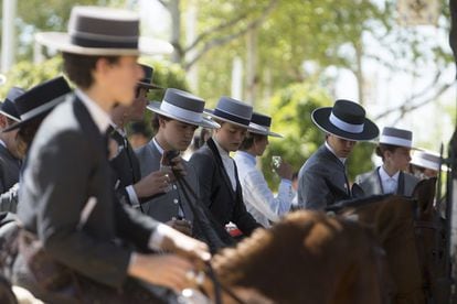 The riders' clothes can be traced back to the days when workers in the fields watched over the livestock.
