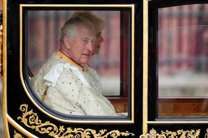 King Charles III and Camilla, the queen consort, in the carriage prior to his coronation, May 6, 2023 in London.