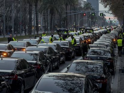 VTC vehicles block a street in Barcelona on January 19.