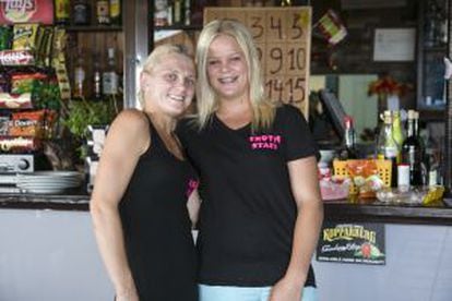 Kayleigh Smith (left) and Sophie Jones at the Calpe bar where they both work.