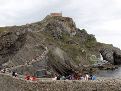 Tourists at the San Juan de Gaztelugatxe hermitage in Bermeo.