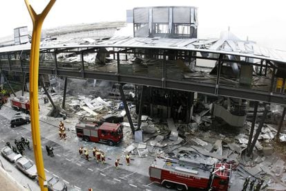 Fire crews on the scene of the 2006 bombing of a parking lot at Madrid’s Barajas airport, which killed two.