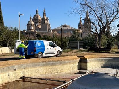 Barcelona water management workers repair a fountain in the Montjuïc neighborhood.