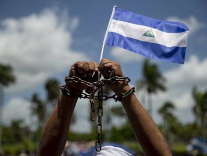 A member of the Nicaraguan opposition participates in a mass, held to pray for the release of political prisoners