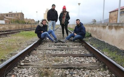 Four youngsters from Llerena, Badajoz, hang out on the oldest rail tracks in Spain. The tracks date back to the 19th century and are made from wood.