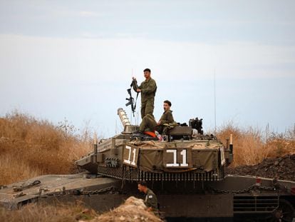 Israeli soldiers in a tank in the Galilee area, near the border with Lebanon, on Monday.