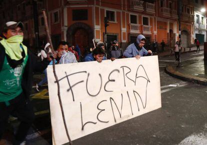 Demonstrators hold a sign reading ”Get out Lenín” during protests in the Ecuadorian capital, Quito, in October.