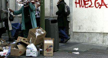 Garbage piles up in the district of Atocha in the center of Madrid as street cleaners go on indefinite strike to protest layoffs.