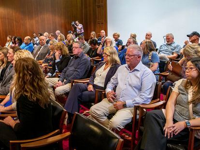 A crowd prepares for a Michigan Court of Appeals hearing in the case against Christopher Schurr to begin in downtown Grand Rapids, Mich., on Wednesday, Sept. 6, 2023