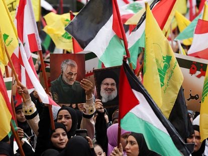 Followers of the Lebanese militia Hezbollah demonstrate in Beirut in support of the Palestinians of Gaza and Hamas, on October 13.