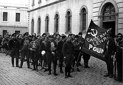 George Orwell, on the far left, among the POUM soldiers at the Lenin barracks in Barcelona. 