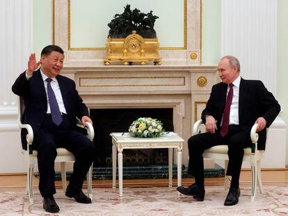 Chinese President Xi Jinping, left, with his Russian counterpart, Vladimir Putin, during their meeting in Moscow on Monday.