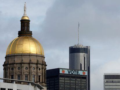 A general view of the Atlanta skyline includes the Georgia Capitol dome and a 'Vote' sign days ahead of U.S. Senate and state governor elections in Atlanta, Georgia, November 6, 2022.