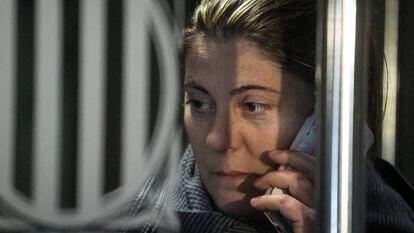 Nadia’s mother speaks on the phone at the courthouse in La Seu d'Urgell.
