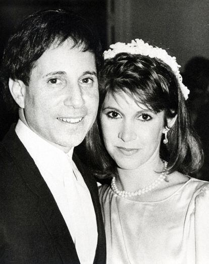 Paul Simon and Carrie Fisher at their wedding, held in the singer's New York apartment, on August 16, 1983.