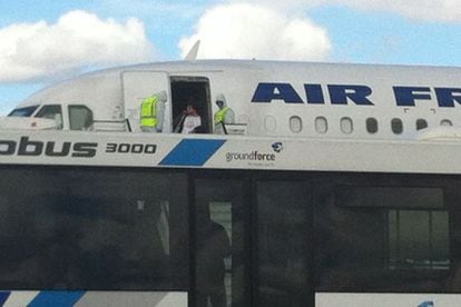 Passengers are disembarked from the Air France flight.