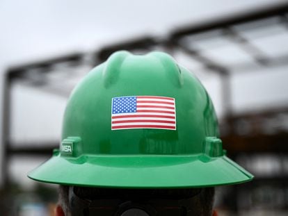 U.S. flag on a construction worker's hardhat at Los Angeles Airport; January 17, 2024.